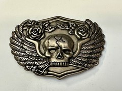 Dimensional Skull Head With Wings And Flowers – Raised Belt Buckle