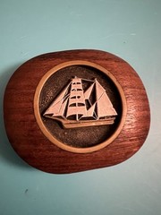 Belt buckle carved wood and pewter inlay of a sailboat