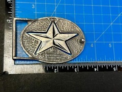 Moving Reversible Star (Red or Black) Belt Buckle by Heavy Metal Manufacturing
