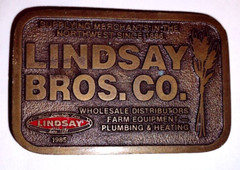 Lindsay Brothers Co Plumbing & Agriculture Supplies 1985 Brass Belt Buckle Vtg