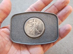 1918 WALKING LIBERTY HALF DOLLAR BELT BUCKLE, 90% SILVER COIN IN PEWTER BUCKLE