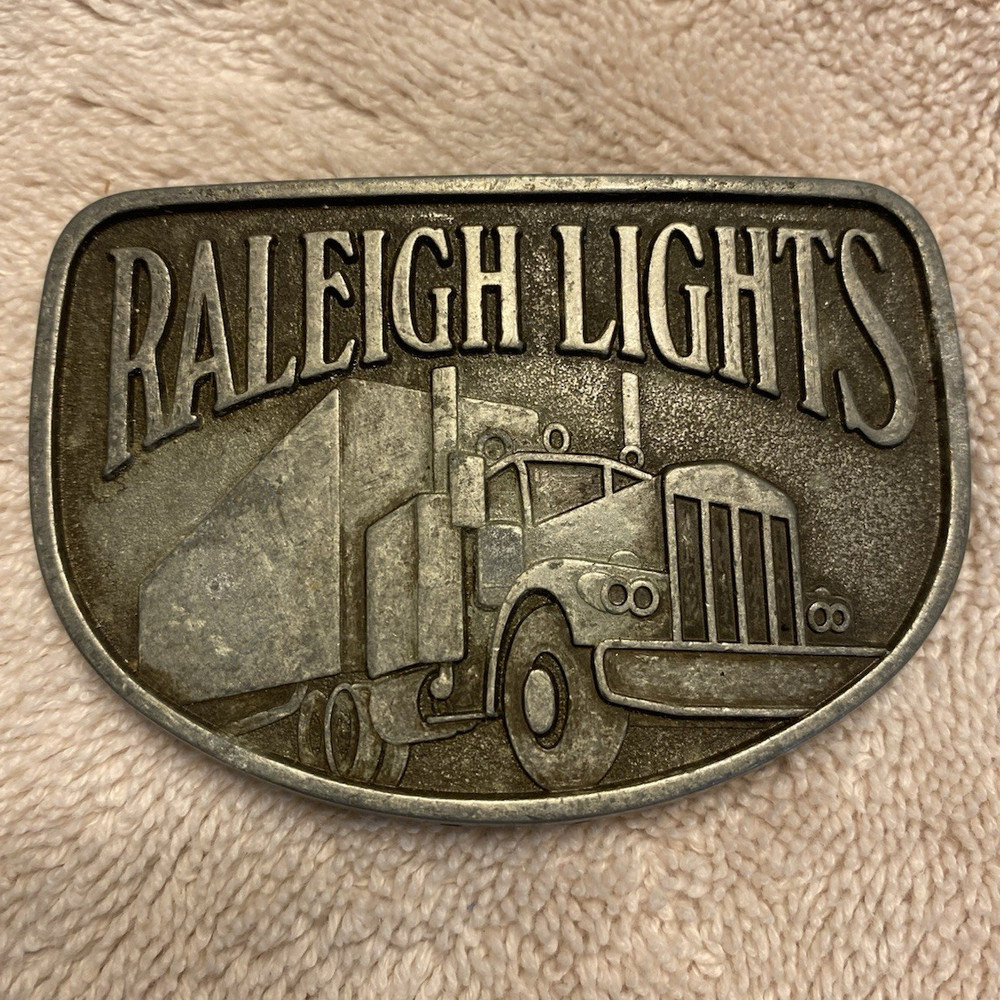 Raleigh Lights Silver Western Belt Buckle Rectangle Truck Graphic Logo