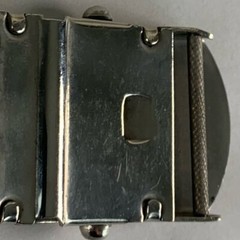 U.S. Navy belt buckle. “U.S.S. Algol AKA-54. Raised ship graphic.