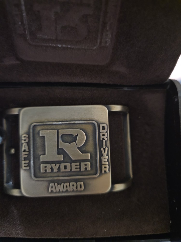 Vintage Ryder Truck Safe driver brass belt buckle Jostens 3&Prime; x 2&Prime; in box