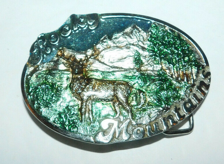 NEAT 1983 ULTRA ENT INC ROCKY MOUNTAINS BELT BUCKLE HAND CARVED BY PAULA FREED