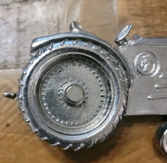 2004 Olander silver tractor belt buckle spinning back wheel