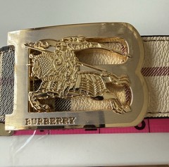 Burberry reversible belt in sand tone. polished metal buckle of the Equestrian