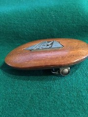 Belt buckle Hand carved wood and pewter inlay of a sailboat