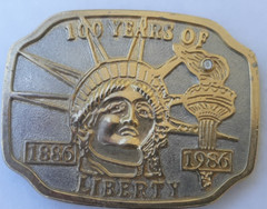 belt buckle 100 years of Statue of Liberty gold with gem in torch 1986…3.25&Prime;