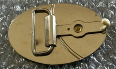SIMPLE SHINY SILVER TONED OVAL WESTERN BELT BUCKLE WITH A 3D GOLD COLORED HORSE