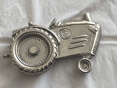 2004 Olander silver tractor belt buckle spinning back wheel