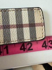 Burberry reversible belt in sand tone. polished metal buckle of the Equestrian