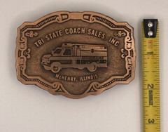 AMBULANCE BELT BUCKLE / TRI-STATE COACH SALES, INC. Mc HENRY, ILLINOIS