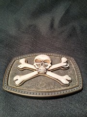 SKULL & CROSSBONES JOLLY ROGER BELT BUCKLE W/ RAISED SKULL & BONES 41/2 BY 3 IN
