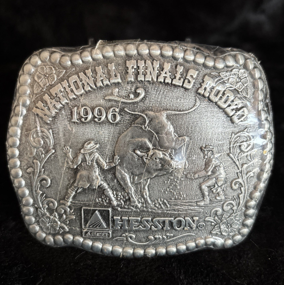 Hesston NFR 1996 Commemorative Belt Buckle New in Shrinkwrap Award Design Medals
