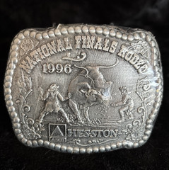 Hesston NFR 1996 Commemorative Belt Buckle New in Shrinkwrap Award Design Medals