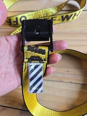 Off-White Industrial Belt in the yellow and black colorway, featuring a black…