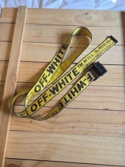 Off-White Industrial Belt in the yellow and black colorway, featuring a black…