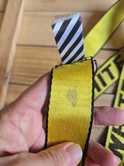 Off-White Industrial Belt in the yellow and black colorway, featuring a black…