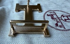 Hermès belt buckle in polished palladium, complete with its signature pouch