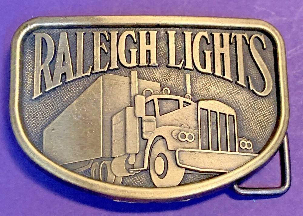 VINTAGE 1970s RALEIGH LIGHTS Metal Belt Buckle Tobacco Cigarette Ad SEMI TRUCK