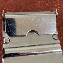 U.S. Navy belt buckle. “U.S.S. Algol AKA-54. Raised ship graphic.