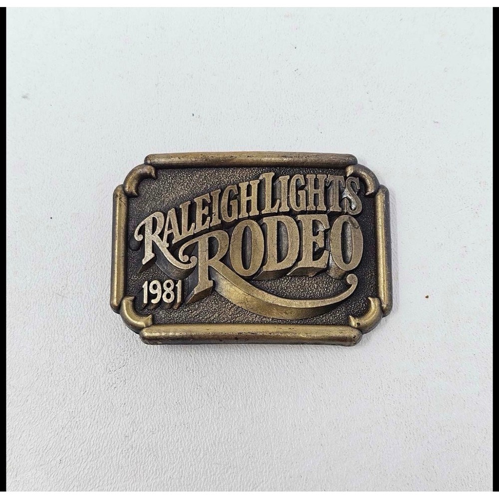 Raleigh Lights Rodeo 1981 Belt Buckle Vintage Western Cowboy Brass Tone
