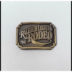 Raleigh Lights Rodeo 1981 Belt Buckle Vintage Western Cowboy Brass Tone