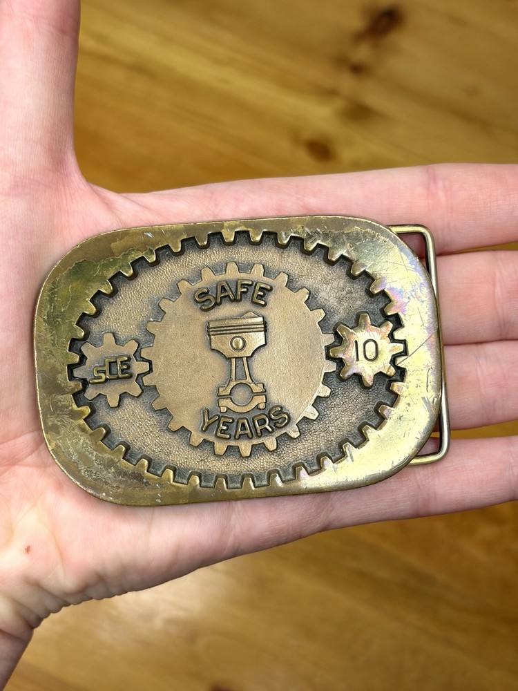 VINTAGE JOSTENS SCE 10 YEAR SAFETY AWARD BRASS BELT BUCKLE