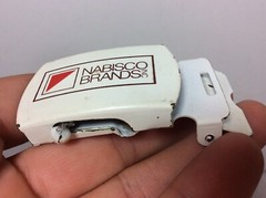 NABISCO BRANDS INC ADVERTISING WHITE w OLD RED LOGO SLIP BELT BUCKLE MADE IN USA