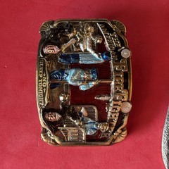 2 belt buckles 1986 American Firefighter, Eagle Flag 1990 Siskiyou Made in USA