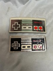 Two Nintendo Game Controller Belt Buckles