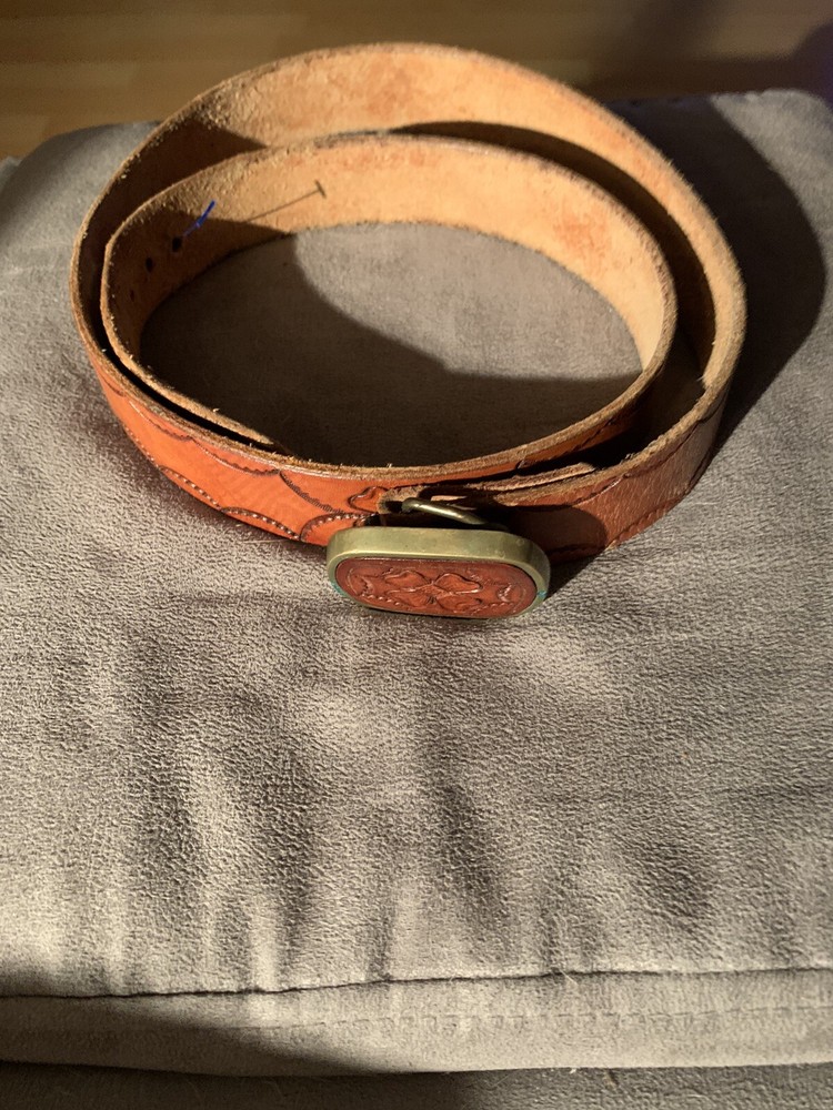 Shambu Belt And Buckle. Flower design, light brown and very unique