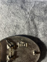 Silver-toned Belt Buckle with Black Enamel and Flying Eagle. Made in USA.