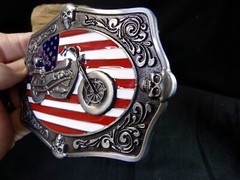 Motorcycle Belt Buckle with the American Flag & 4 Skulls in the middle & ends.
