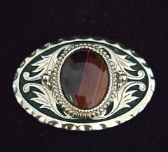 Western oval belt buckle silver/black floral w/ brown stone 1.5 in