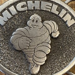 VINTAGE 80’s Michelin Man Tire Belt Buckle Made In USA, Great American Buckle Co