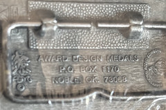 Hesston NFR 1996 Commemorative Belt Buckle New in Shrinkwrap Award Design Medals