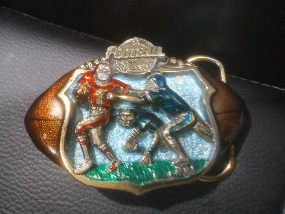 The Great American Belt Buckle Co 1982 Football Serialized solid Brass Enameled