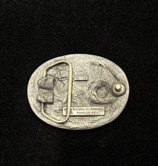 Vintage USMC belt buckle features red enamel background “First to Fight” RARE