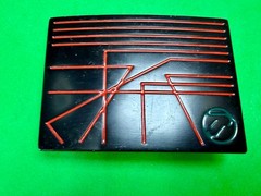 Unknown to me! Geometric Abstract Lines Red Over a Black Enamel Belt Buckle