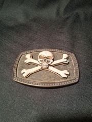 SKULL & CROSSBONES JOLLY ROGER BELT BUCKLE W/ RAISED SKULL & BONES 41/2 BY 3 IN