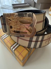 Burberry reversible belt in sand tone. polished metal buckle of the Equestrian